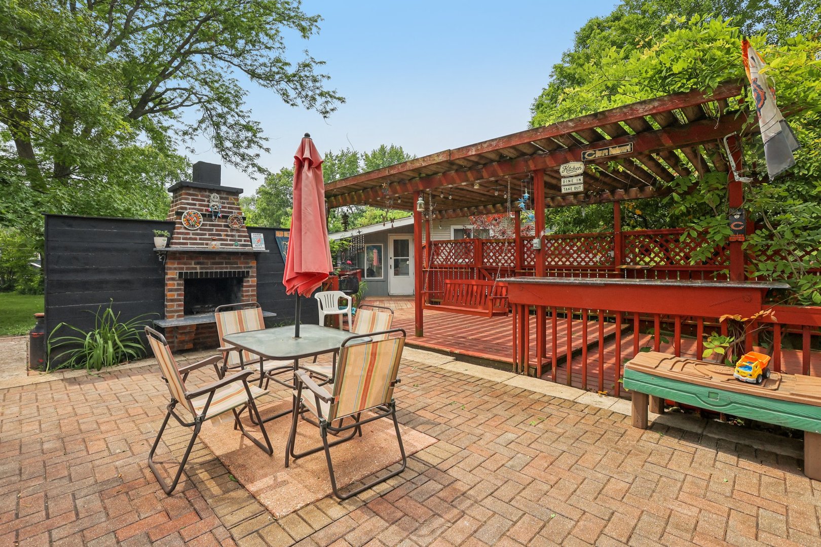 20214 Harmony Road Marengo, IL 60152 - Photo 23 of 56 a view of a chairs and tables in the balcony