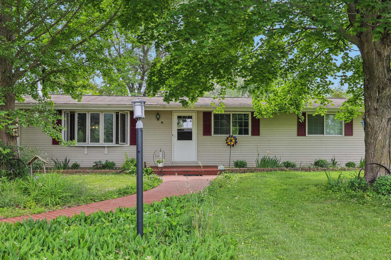 20214 Harmony Road Marengo, IL 60152 - Photo 33 of 56 a view of house with a yard