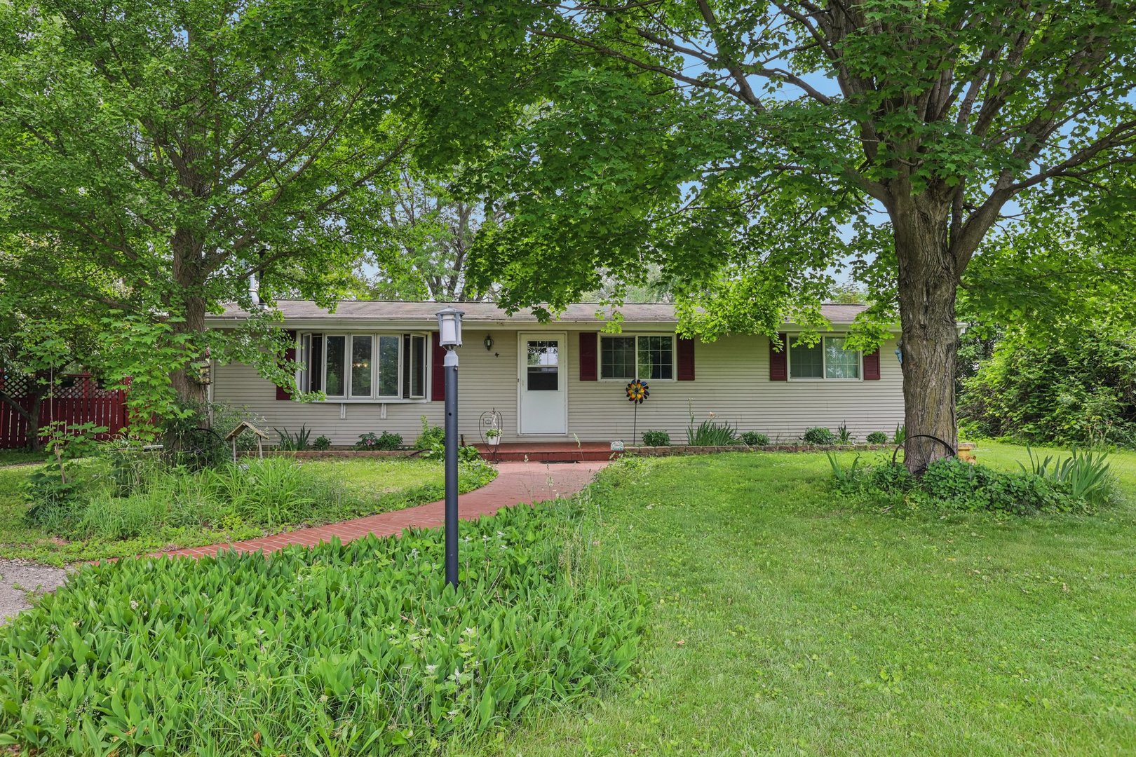 20214 Harmony Road Marengo, IL 60152 - Photo 36 of 56 front view of a house with a yard