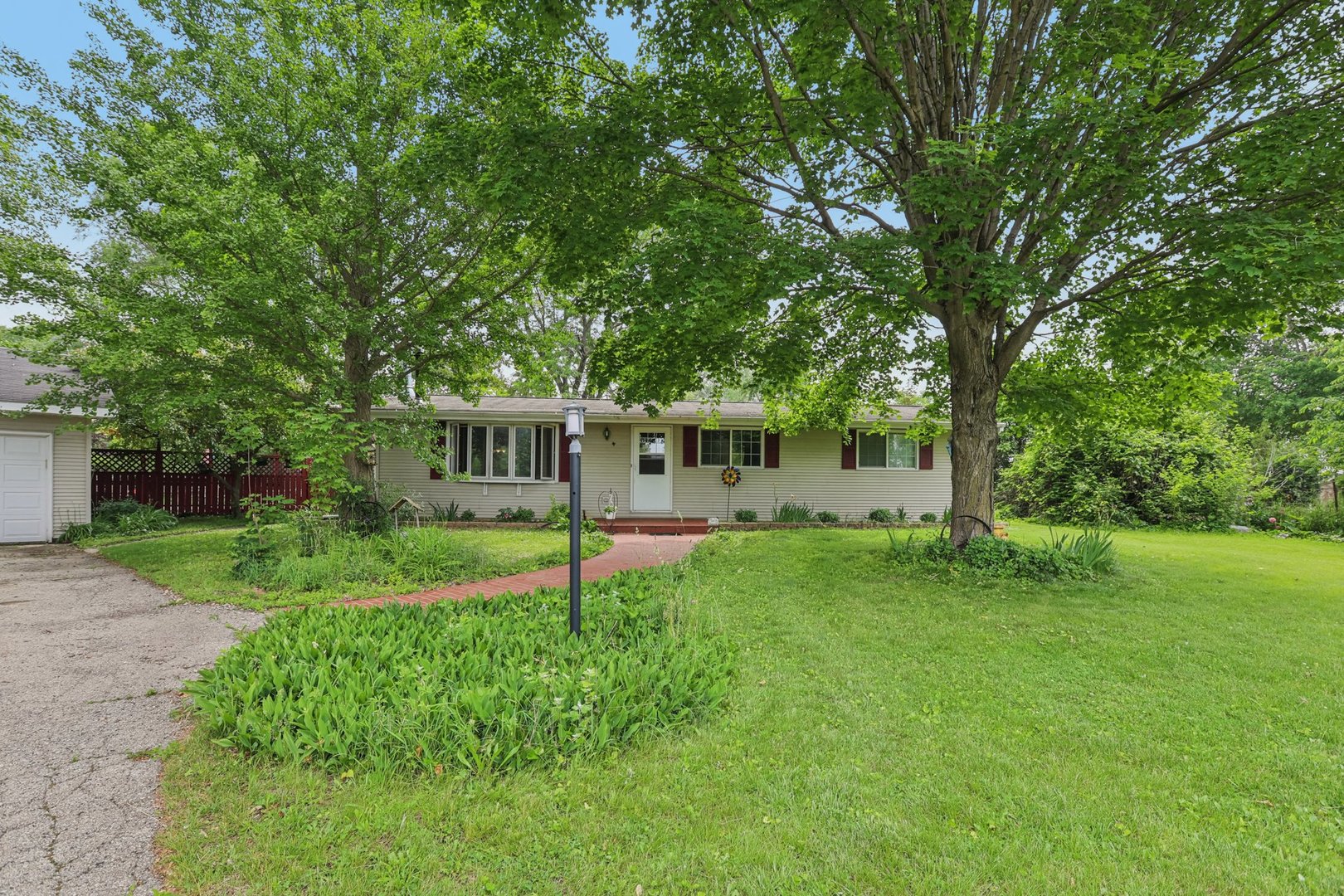 20214 Harmony Road Marengo, IL 60152 - Photo 39 of 56 a view of a house with a back yard