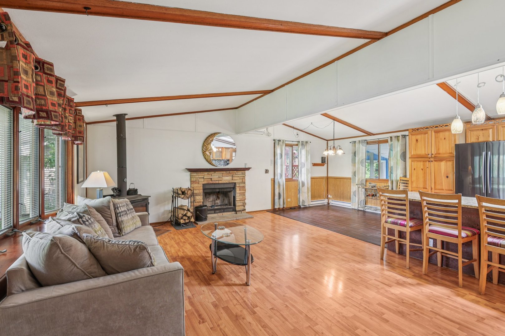 20214 Harmony Road Marengo, IL 60152 - Photo 4 of 56 a living room with furniture a fireplace and wooden floor