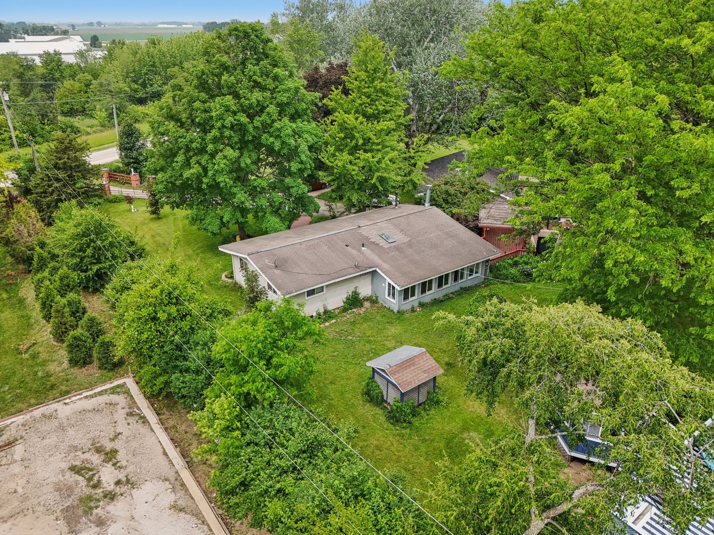 20214 Harmony Road Marengo, IL 60152 - Photo 49 of 56 a view of a house with a yard
