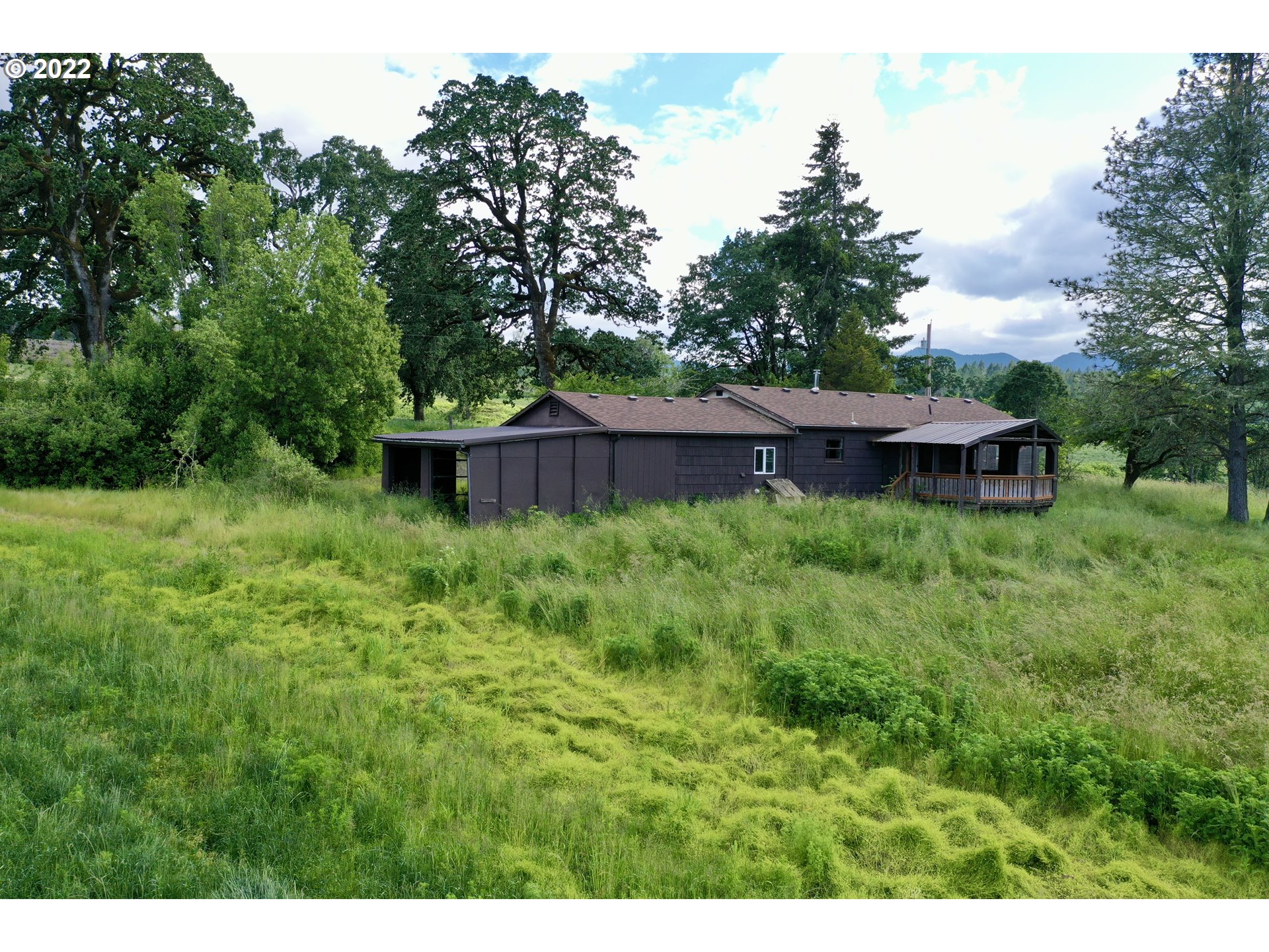 21475 Stone Road Sheridan, OR 97378 - Photo 3 of 18 a view of a house with a backyard