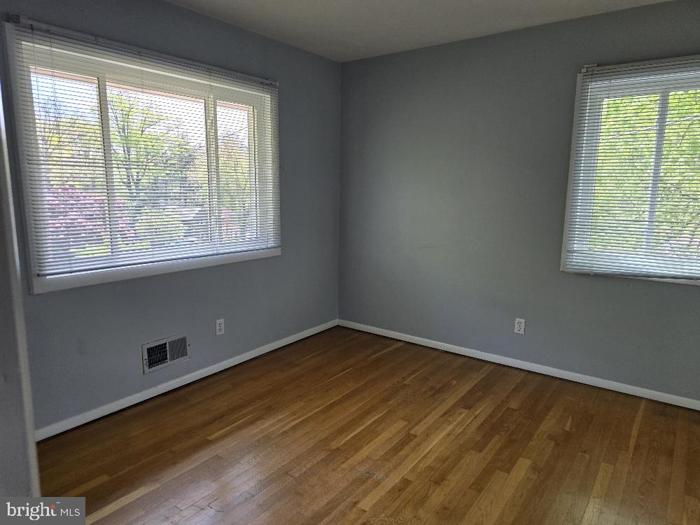 7612 Clive Place Springfield, VA 22151 - Photo 14 of 23 a view of an empty room and window