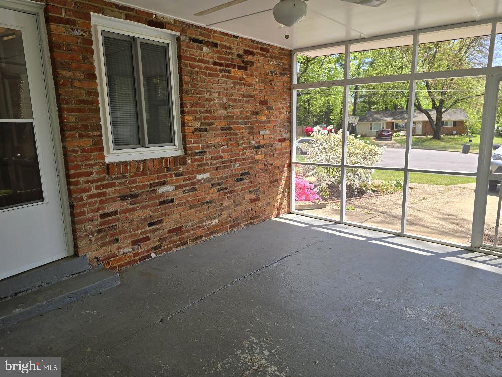 7612 Clive Place Springfield, VA 22151 - Photo 18 of 23 a view of an empty room and window