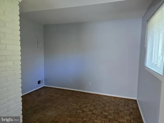 a view of empty room with windows