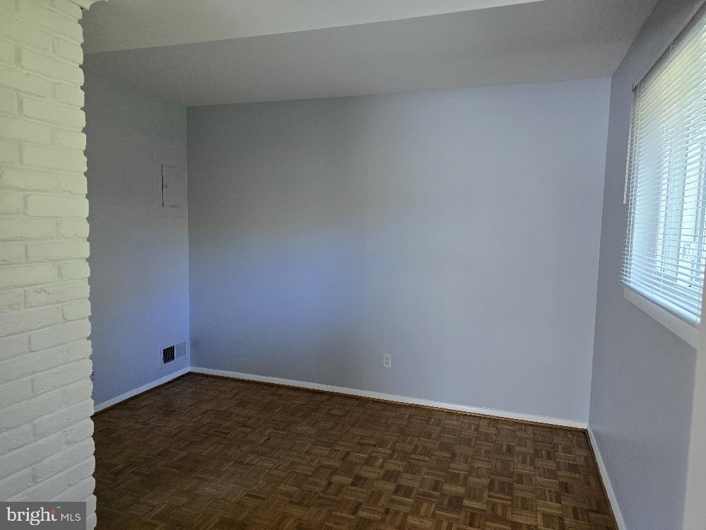7612 Clive Place Springfield, VA 22151 - Photo 9 of 23 a view of empty room with windows