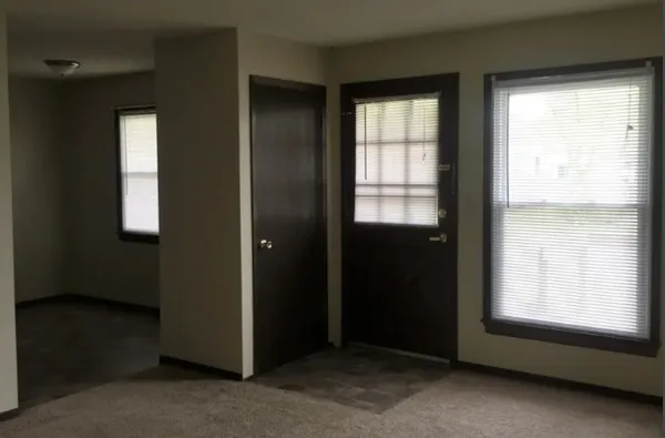a kitchen with stainless steel appliances granite countertop a stove and a refrigerator