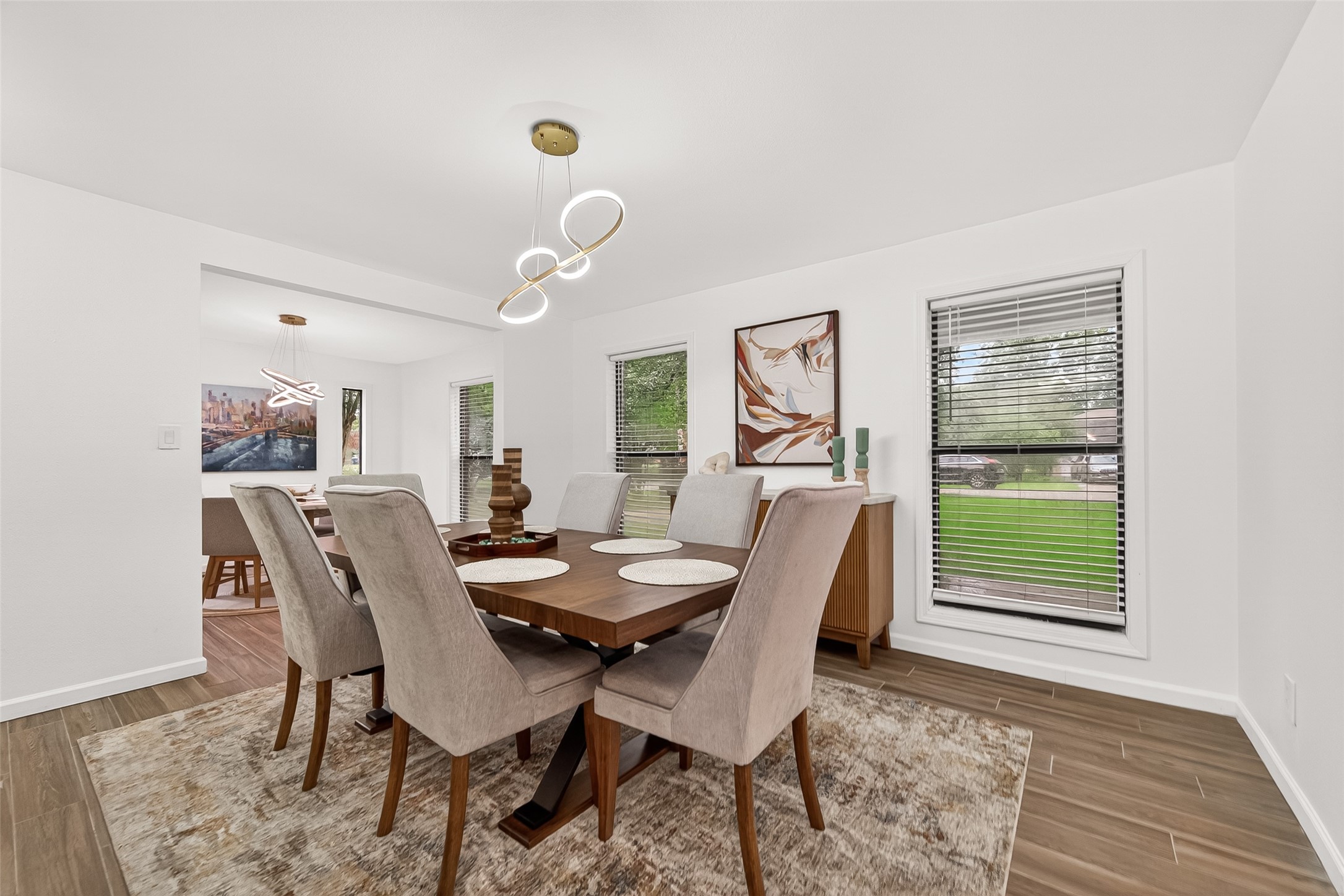 548 Brandon Road Conroe, TX 77302 - Photo 6 of 37 Elegant formal dining room with modern neutral tones and seating for six-perfect for gathering, entertaining, and everyday style.