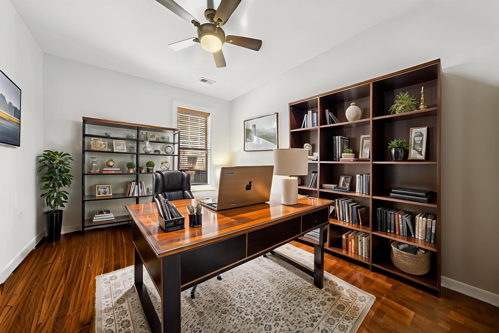 4834 North Kenmore Avenue, Unit 3N Chicago, IL 60640 - Photo 16 of 28 a view of a workspace with furniture and a bookshelf