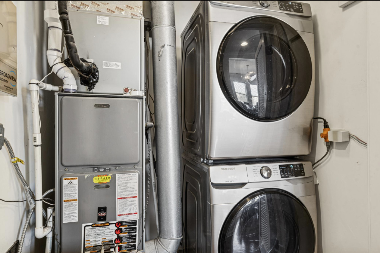 4834 North Kenmore Avenue, Unit 3N Chicago, IL 60640 - Photo 18 of 28 a view of storage and utility room with washer and dryer