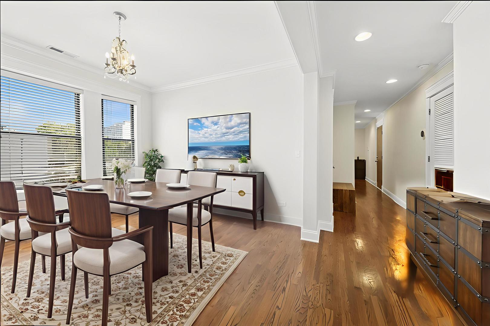4834 North Kenmore Avenue, Unit 3N Chicago, IL 60640 - Photo 10 of 28 a view of a dining room with furniture and wooden floor