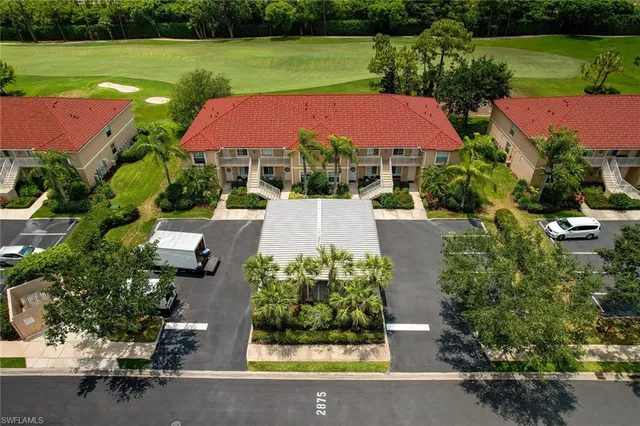 an aerial view of a house with outdoor space pool patio and outdoor seating