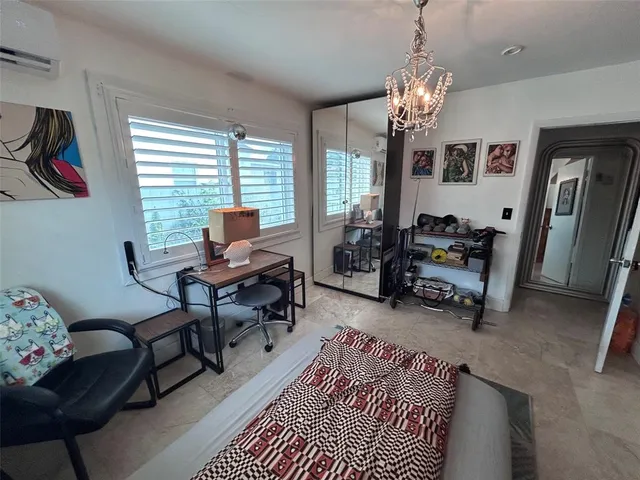 a view of a porch with potted plants