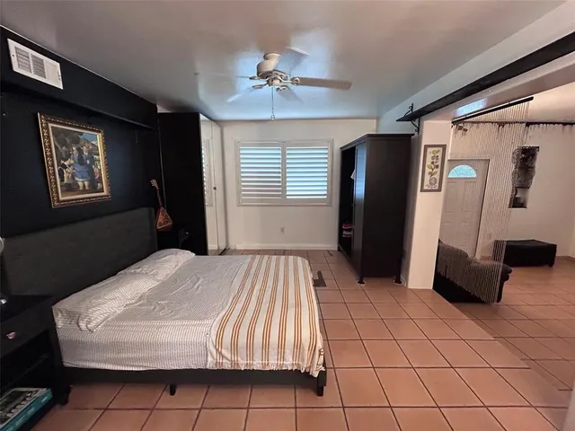 a view of balcony with wooden floor and outdoor seating