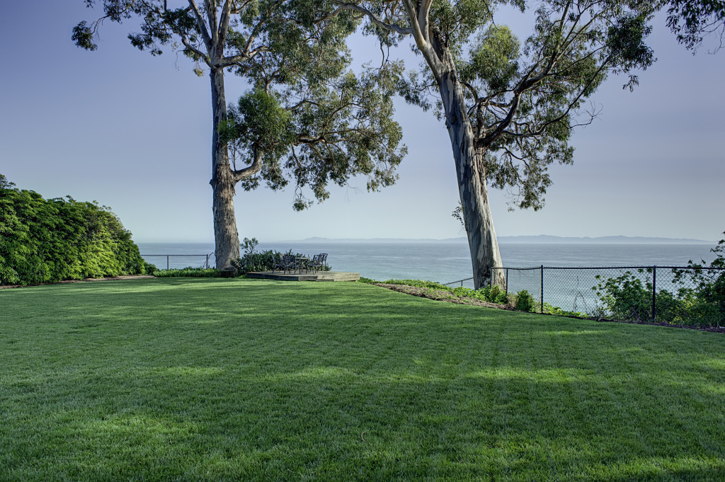 2417 Medcliff Road Santa Barbara, CA 93109 - Photo 14 of 21 a view of a field with a tree in the background