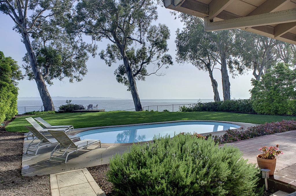2417 Medcliff Road Santa Barbara, CA 93109 - Photo 21 of 21 a view of a garden with wooden fence