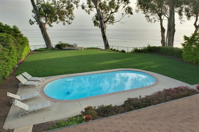 2417 Medcliff Road Santa Barbara, CA 93109 - Photo 4 of 21 a view of a swimming pool with a yard