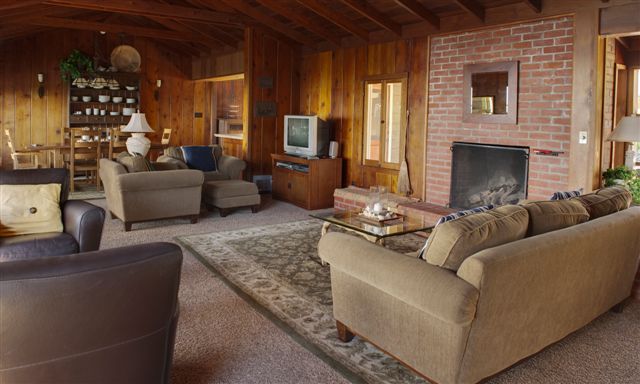 2417 Medcliff Road Santa Barbara, CA 93109 - Photo 7 of 21 a living room with furniture and a fireplace