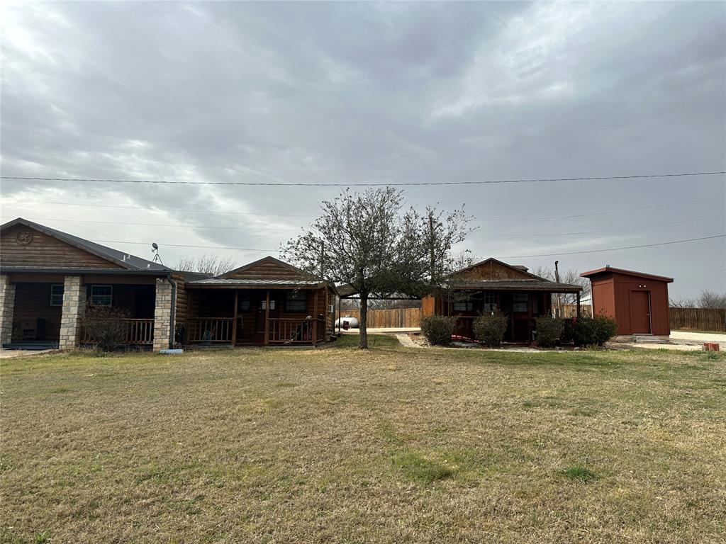 11001 West Lake Road Abilene, TX 79601 - Photo 10 of 40 View of yard featuring covered porch