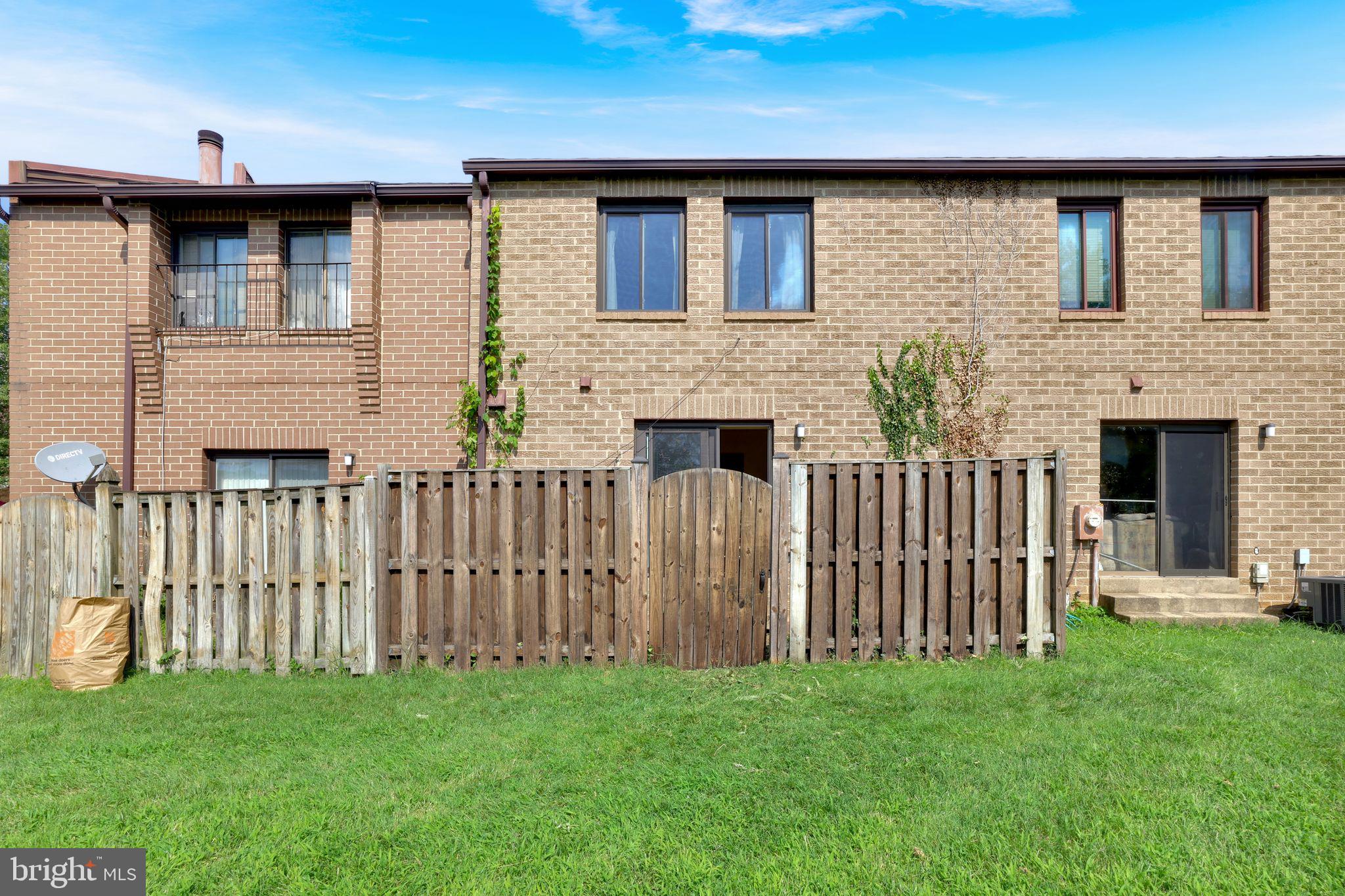 3103 Apple Road Northeast, Unit 1 Washington, DC 20018 - Photo 3 of 4 a front view of a house with a garden