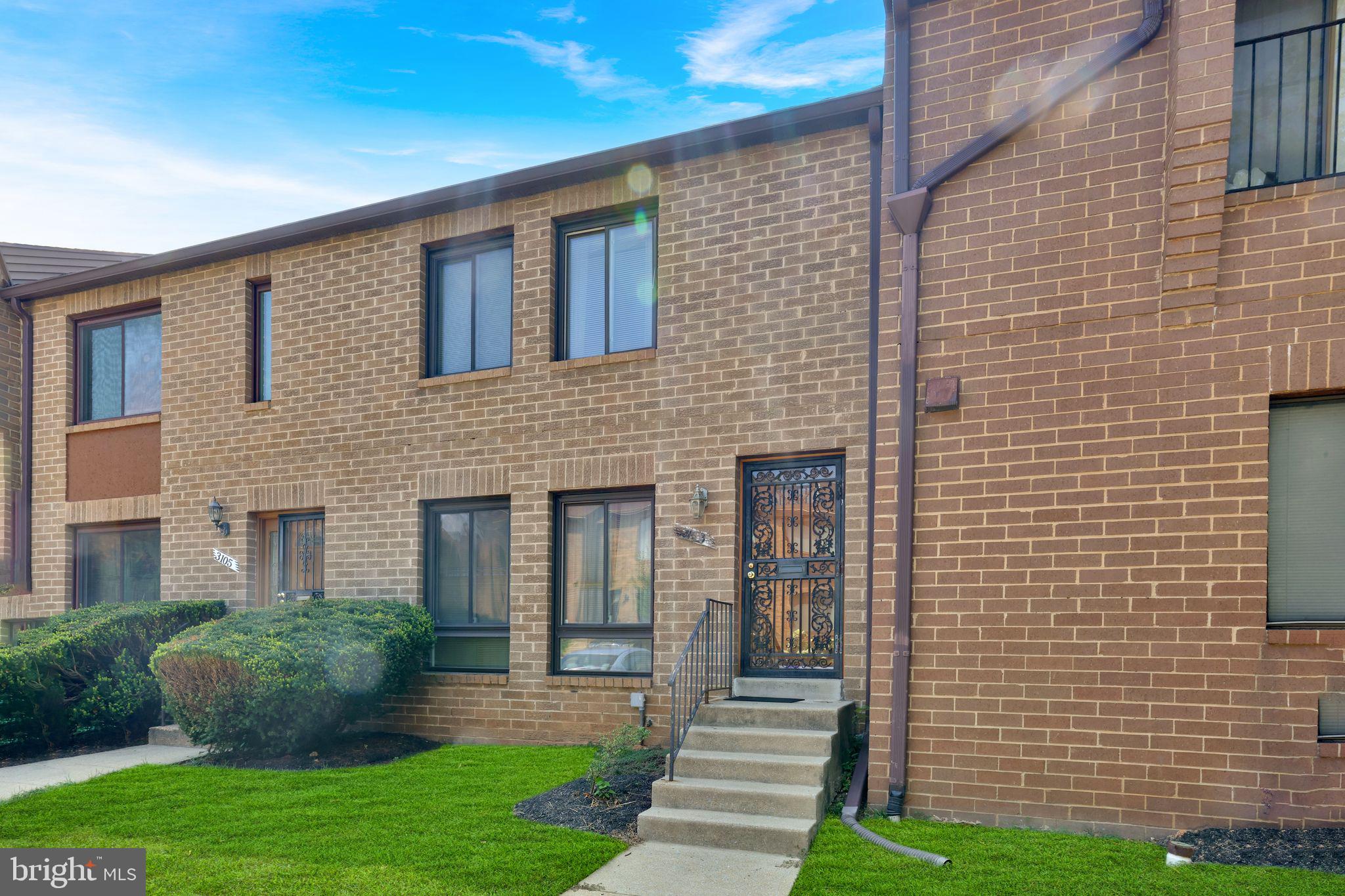 3103 Apple Road Northeast, Unit 1 Washington, DC 20018 - Photo 4 of 4 a front view of a house with garden