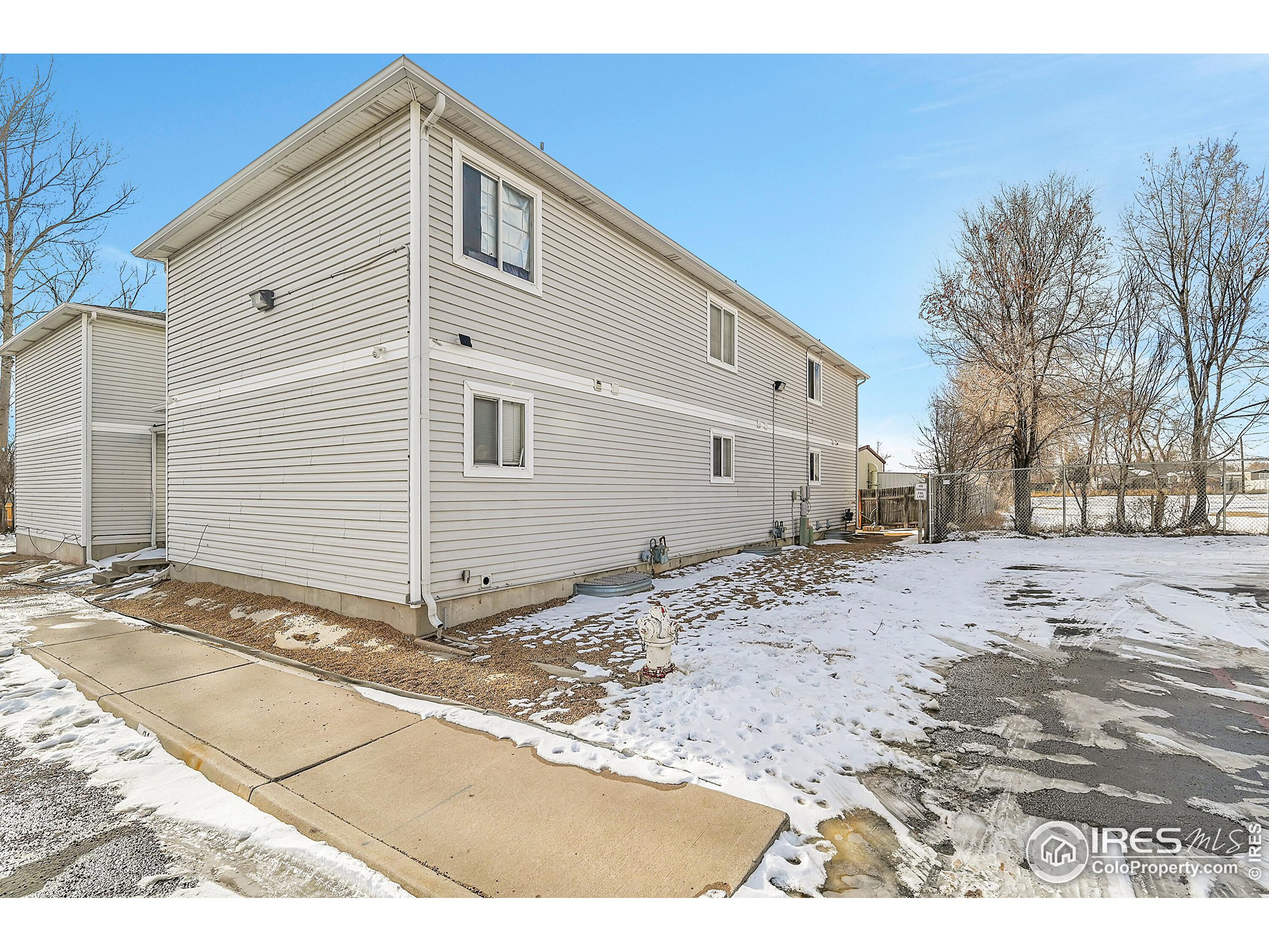 1325 Darrell Road Evans, CO 80620 - Photo 23 of 25 a view of a house with a snow