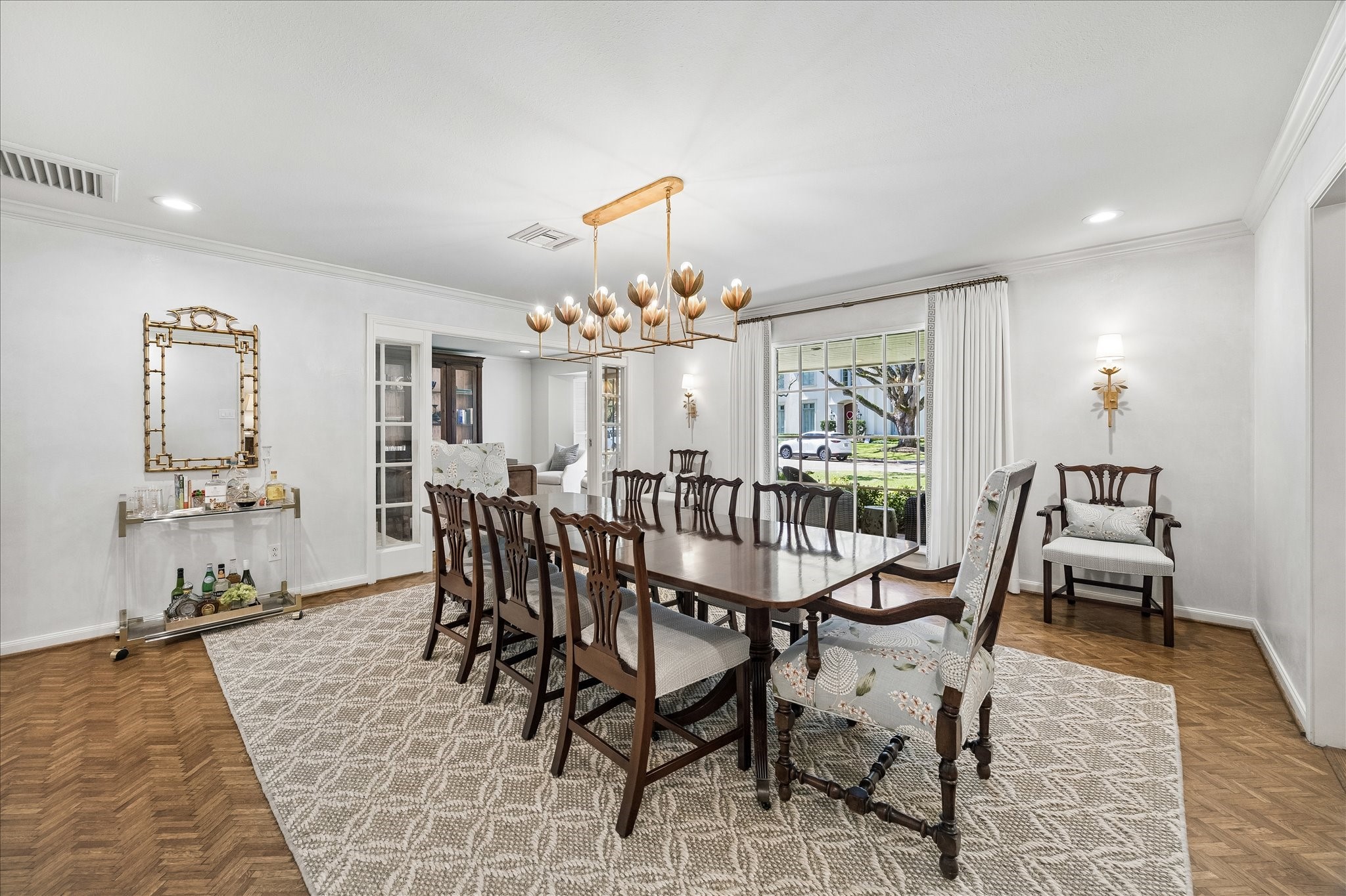 907 Wild Valley Road Houston, TX 77057 - Photo 7 of 31 a view of a dining room with furniture window and outside view