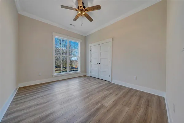a view of lake with residential houses with outdoor space and trees
