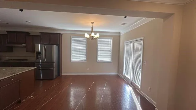 a view of a kitchen with a sink dishwasher and microwave oven