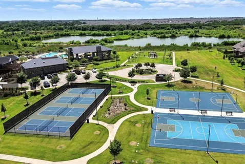 a view of a swimming pool with a lake view