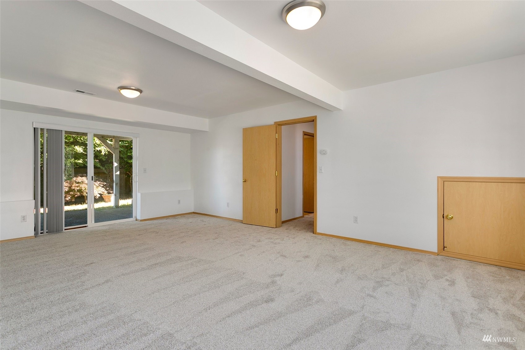 714 Northwest 3rd Court Renton, WA 98057 - Photo 16 of 40 a view of an empty room with a window