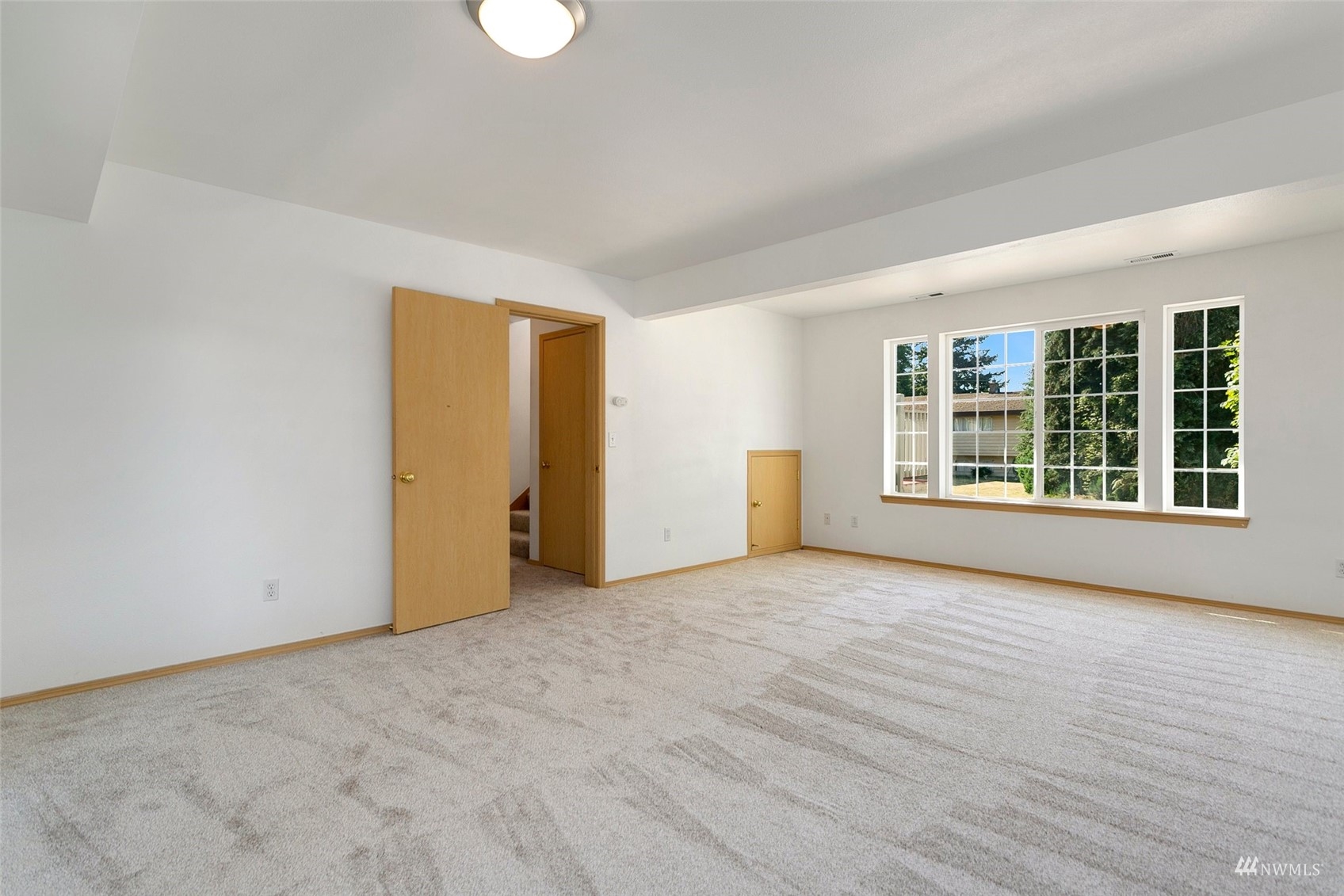 714 Northwest 3rd Court Renton, WA 98057 - Photo 17 of 40 a view of an empty room with a window