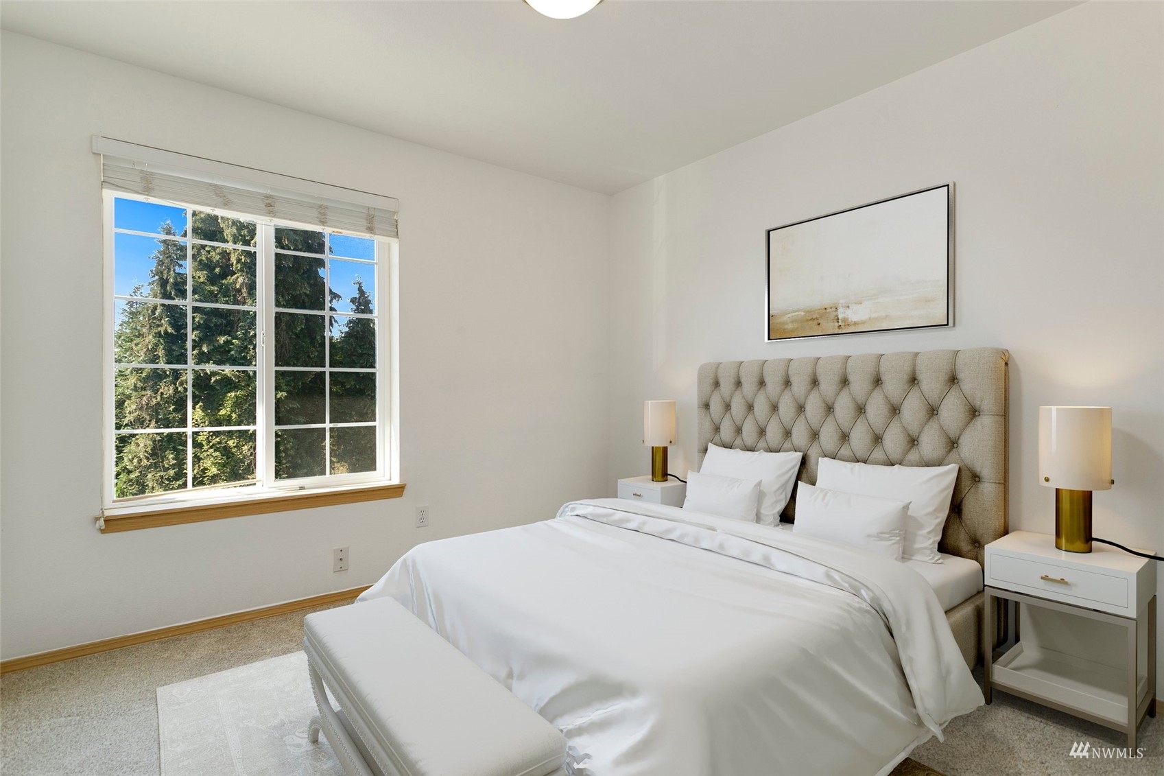714 Northwest 3rd Court Renton, WA 98057 - Photo 28 of 40 a bedroom with a bed and a window