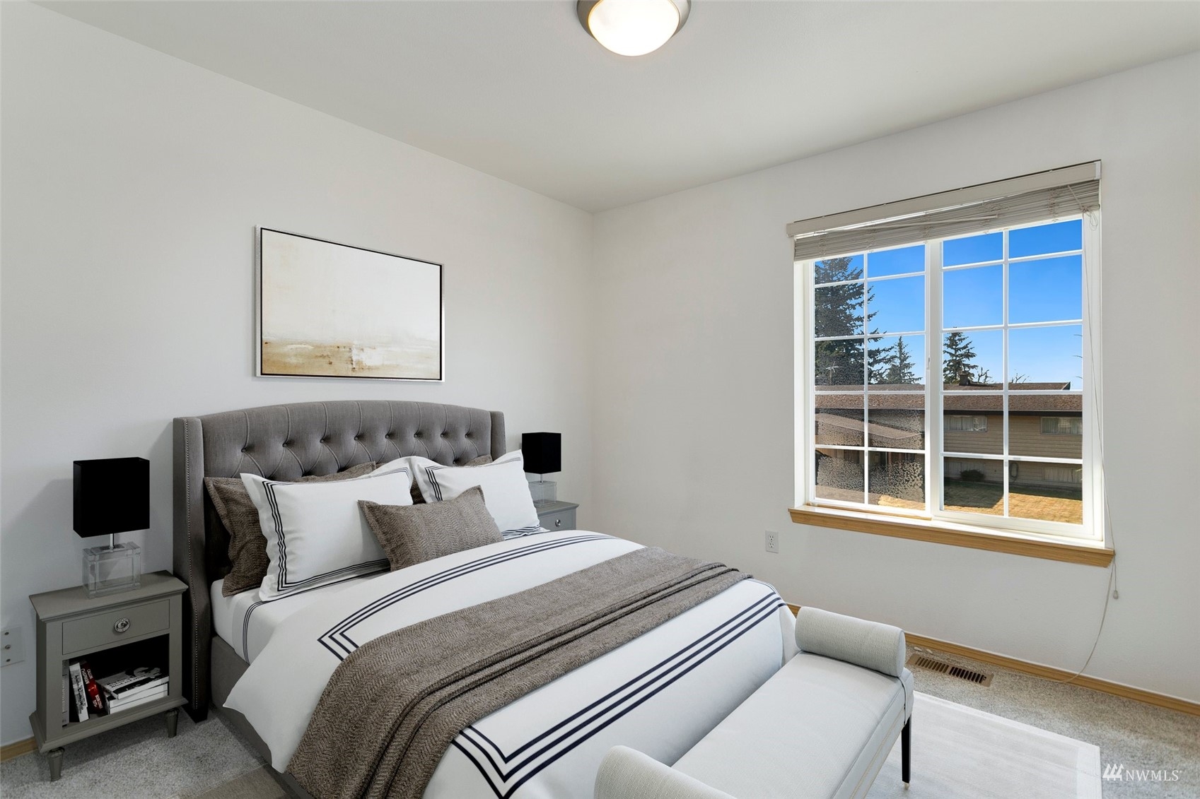 714 Northwest 3rd Court Renton, WA 98057 - Photo 30 of 40 a bedroom with bed and a window