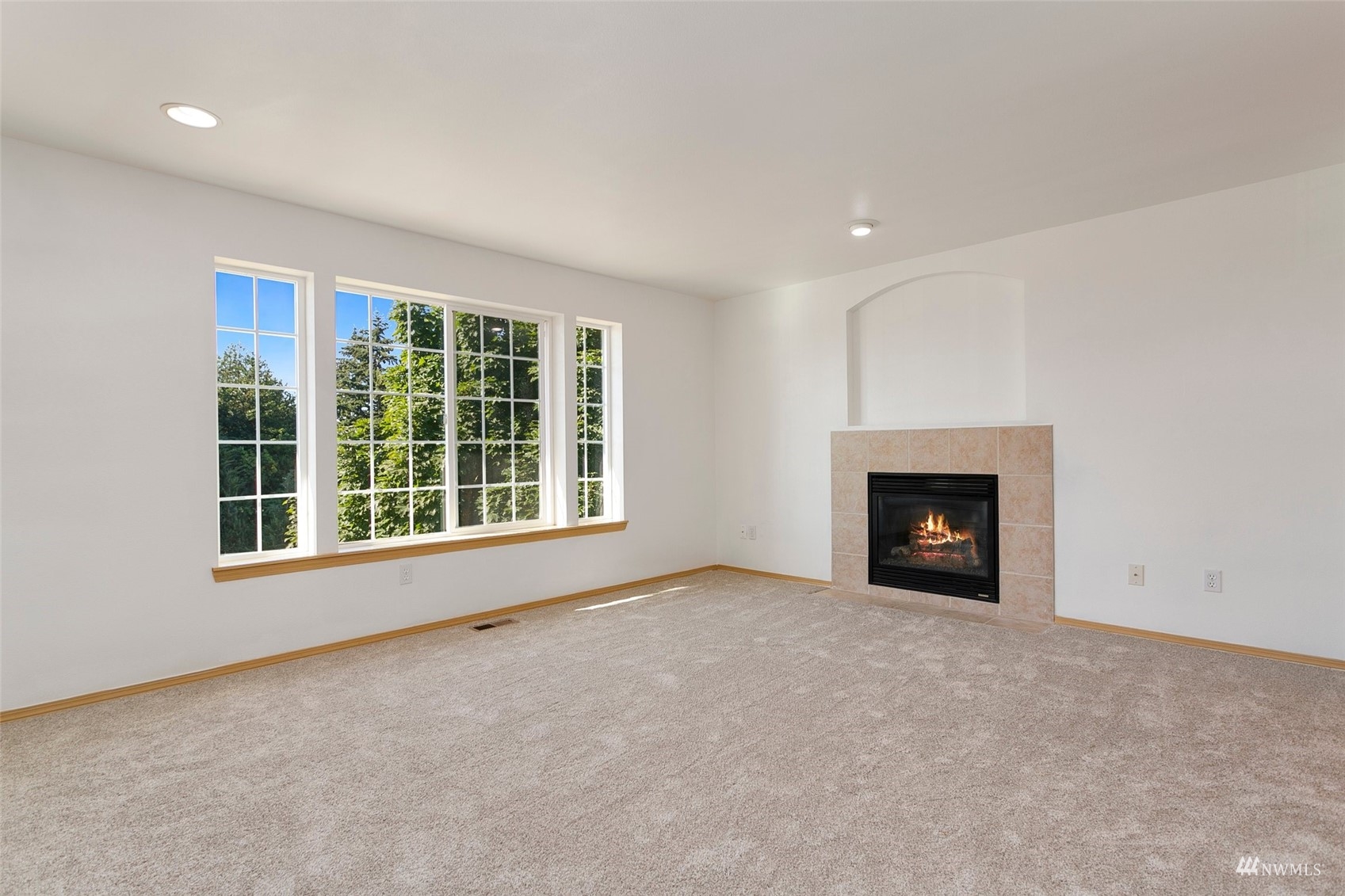 714 Northwest 3rd Court Renton, WA 98057 - Photo 3 of 40 a view of an empty room with a window