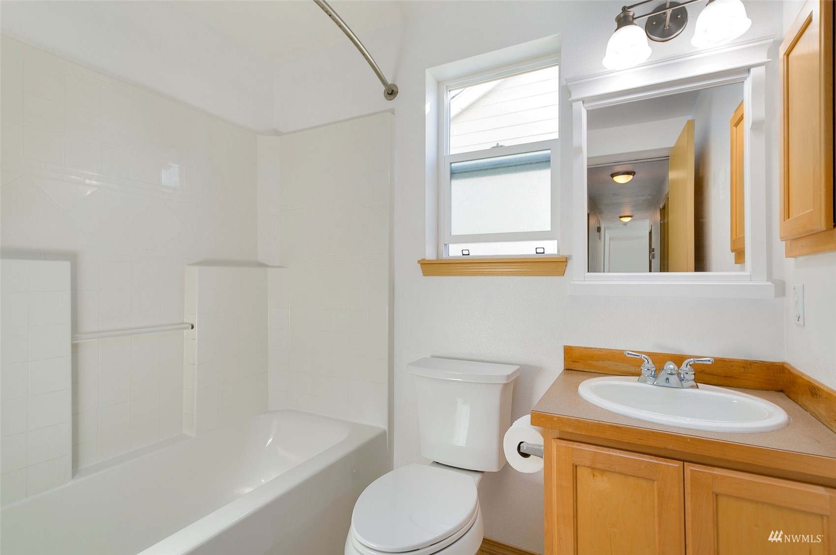 714 Northwest 3rd Court Renton, WA 98057 - Photo 32 of 40 a bathroom with a sink toilet and shower