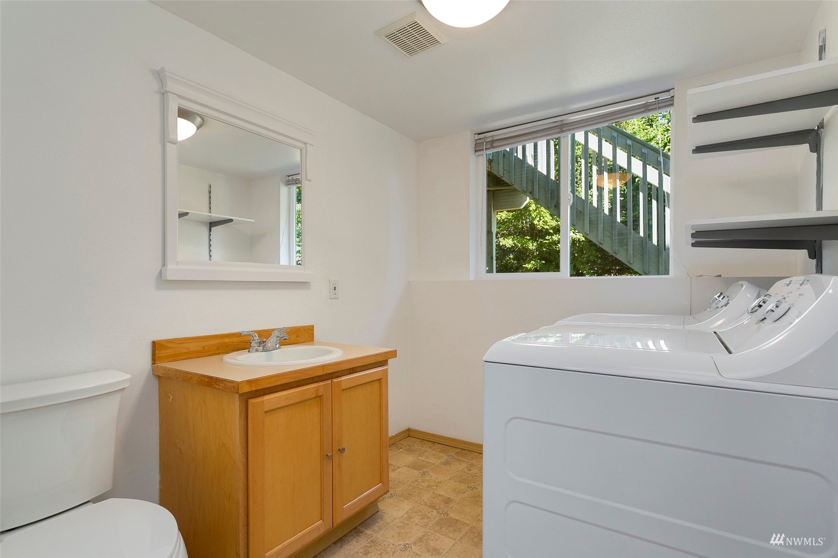 714 Northwest 3rd Court Renton, WA 98057 - Photo 33 of 40 a bathroom with a sink and a toilet