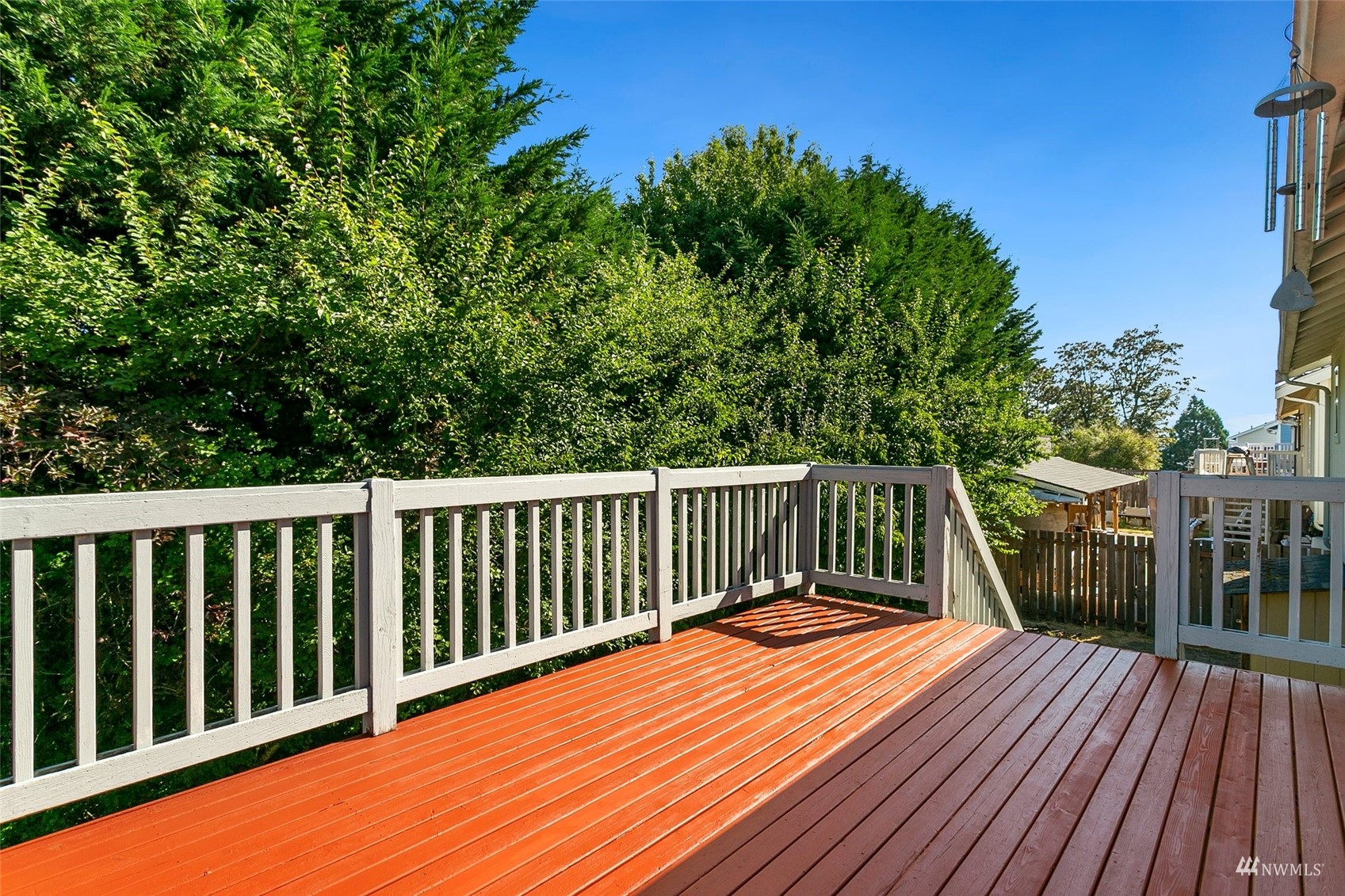 714 Northwest 3rd Court Renton, WA 98057 - Photo 34 of 40 a balcony with wooden floor and fence