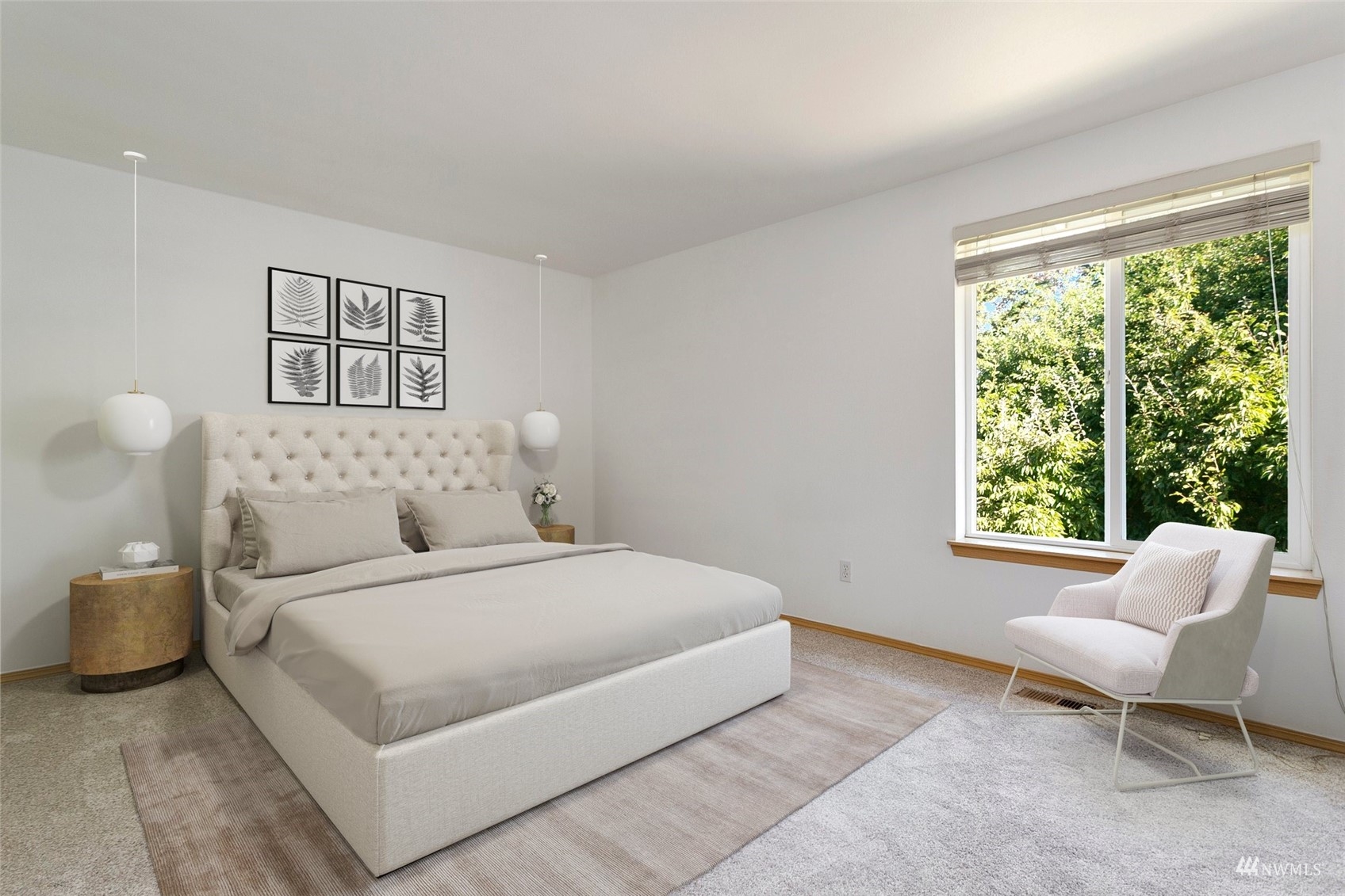 714 Northwest 3rd Court Renton, WA 98057 - Photo 6 of 40 a bedroom with a large bed and a couch