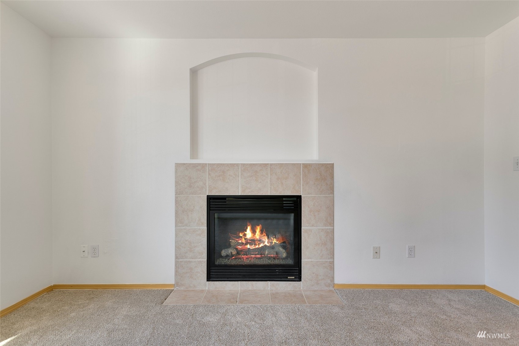 714 Northwest 3rd Court Renton, WA 98057 - Photo 8 of 40 a living room with a fireplace
