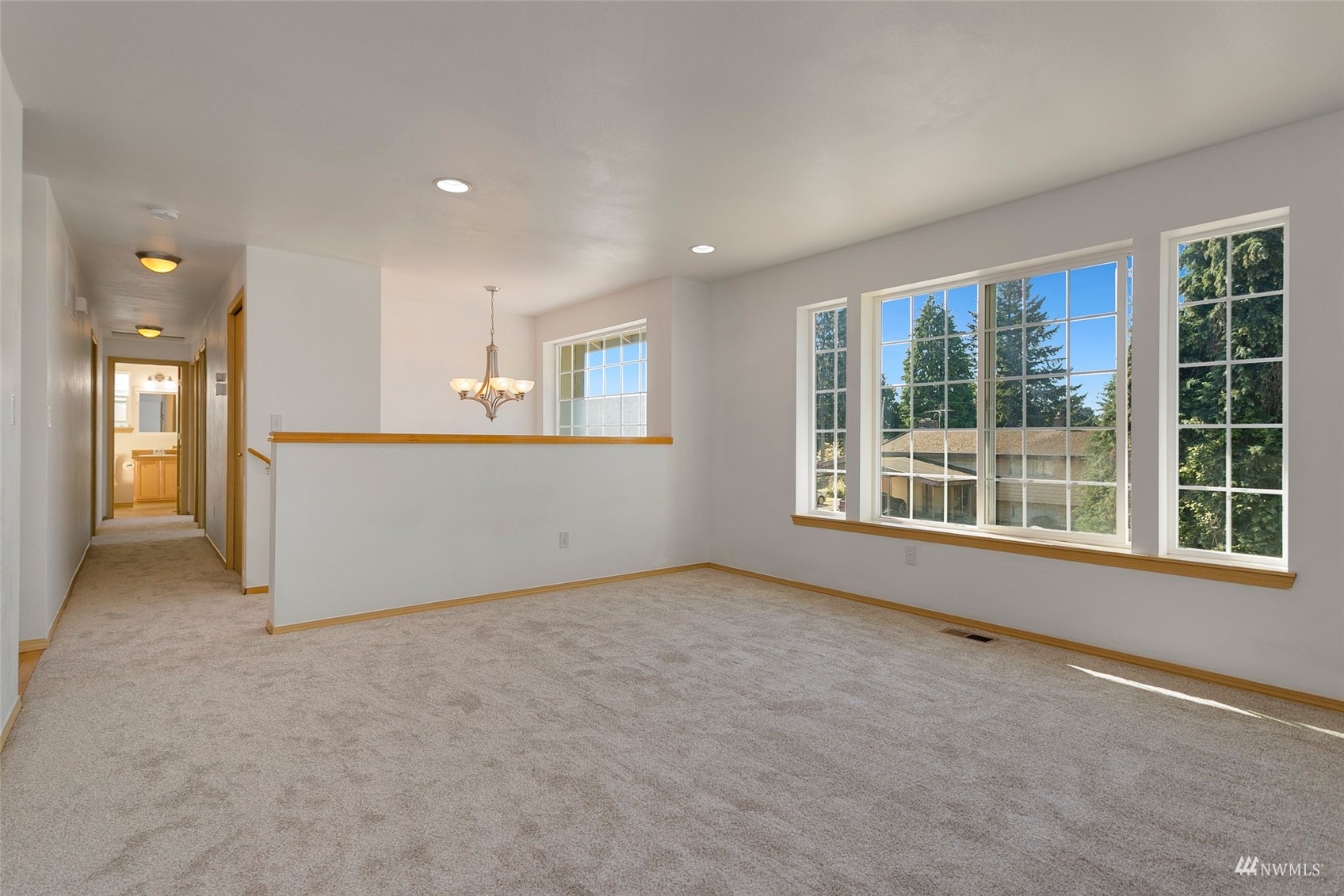 714 Northwest 3rd Court Renton, WA 98057 - Photo 10 of 40 a view of an empty room with a window