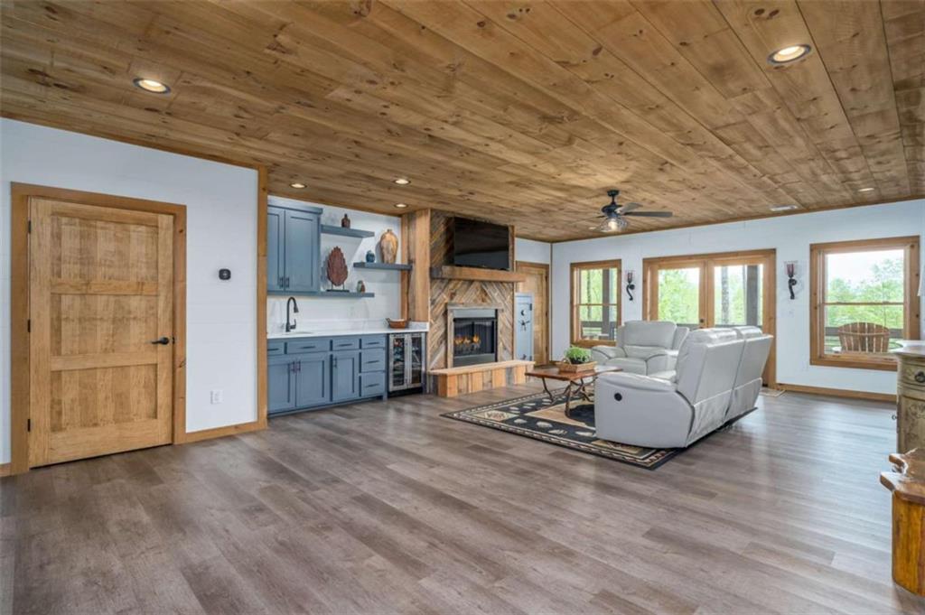 454 North Old Aska Road Blue Ridge, GA 30513 - Photo 20 of 33 a living room with furniture and a fireplace
