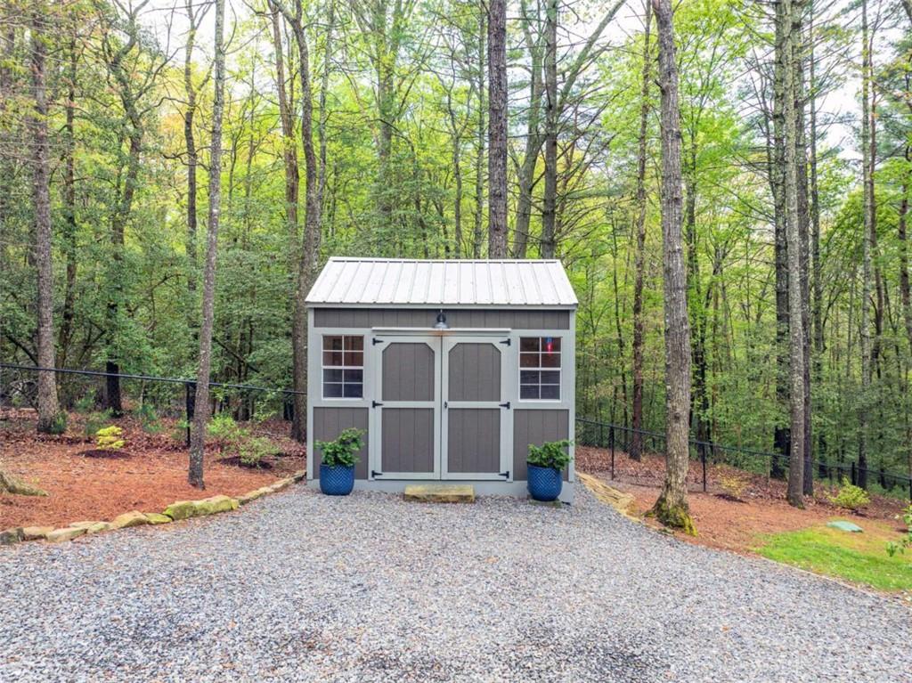 454 North Old Aska Road Blue Ridge, GA 30513 - Photo 7 of 33 a view of a house with backyard