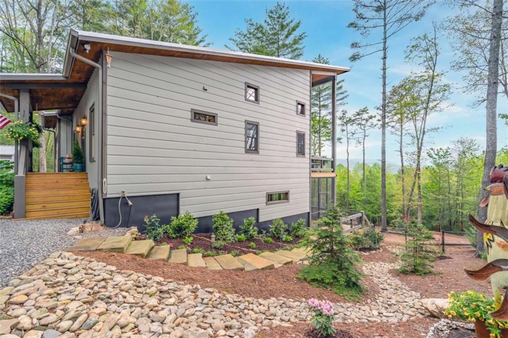 454 North Old Aska Road Blue Ridge, GA 30513 - Photo 8 of 33 a view of a house with backyard and sitting area
