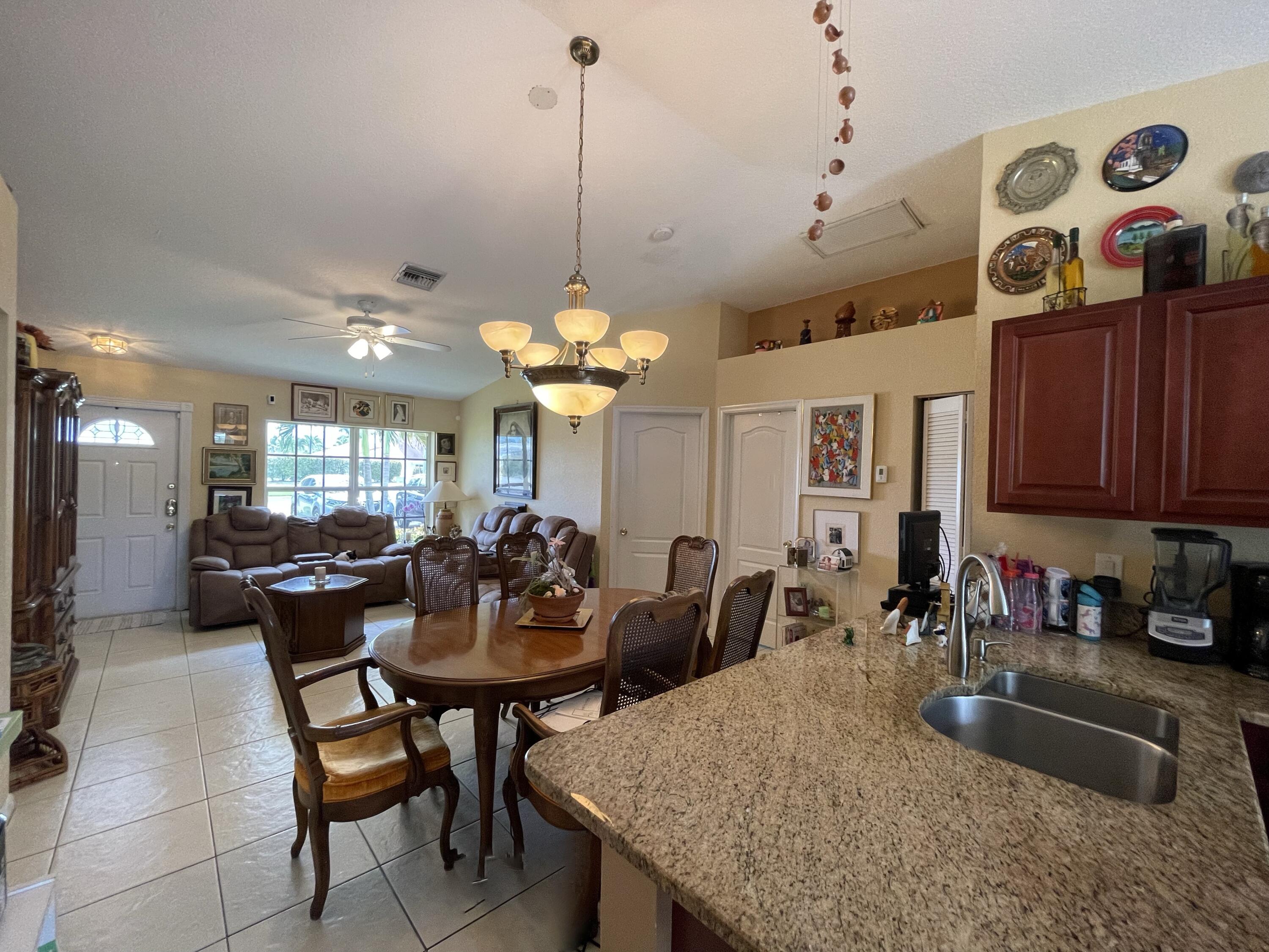 4369 Dale Road Palm Springs, FL 33406 - Photo 4 of 14 OPEN CONCEPT - READY TO ENTERTAIN