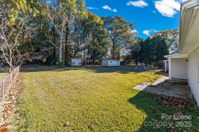 a view of swimming pool with an outdoor space and seating area