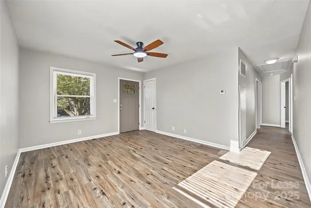 a view of an empty room and window