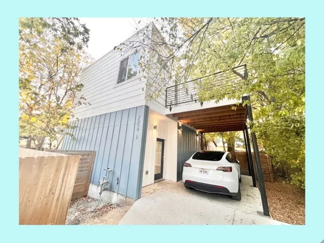 a car parked in front of a house