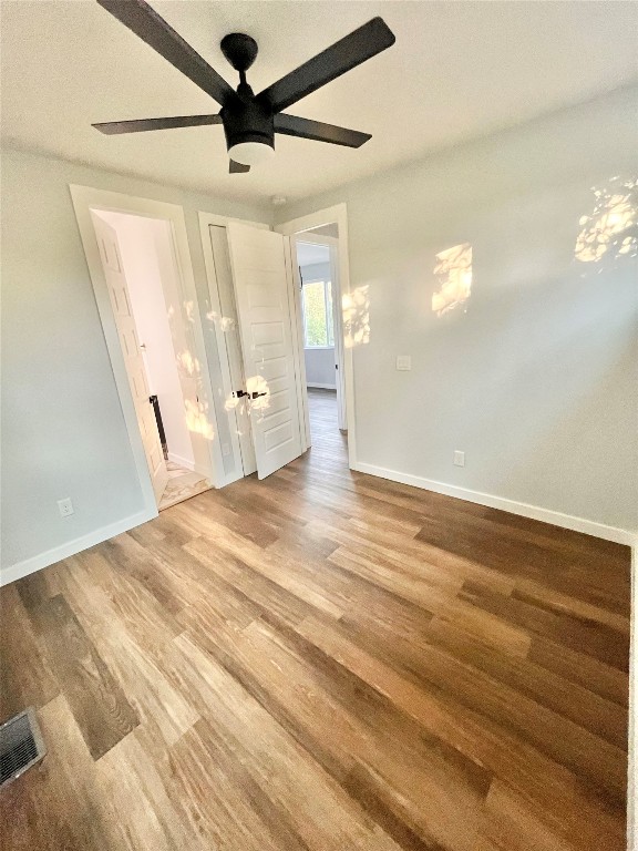 3508 Robinson Avenue, Unit B Austin, TX 78722 - Photo 11 of 17 a view of empty room with wooden floor
